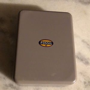 Fossil tin case.
